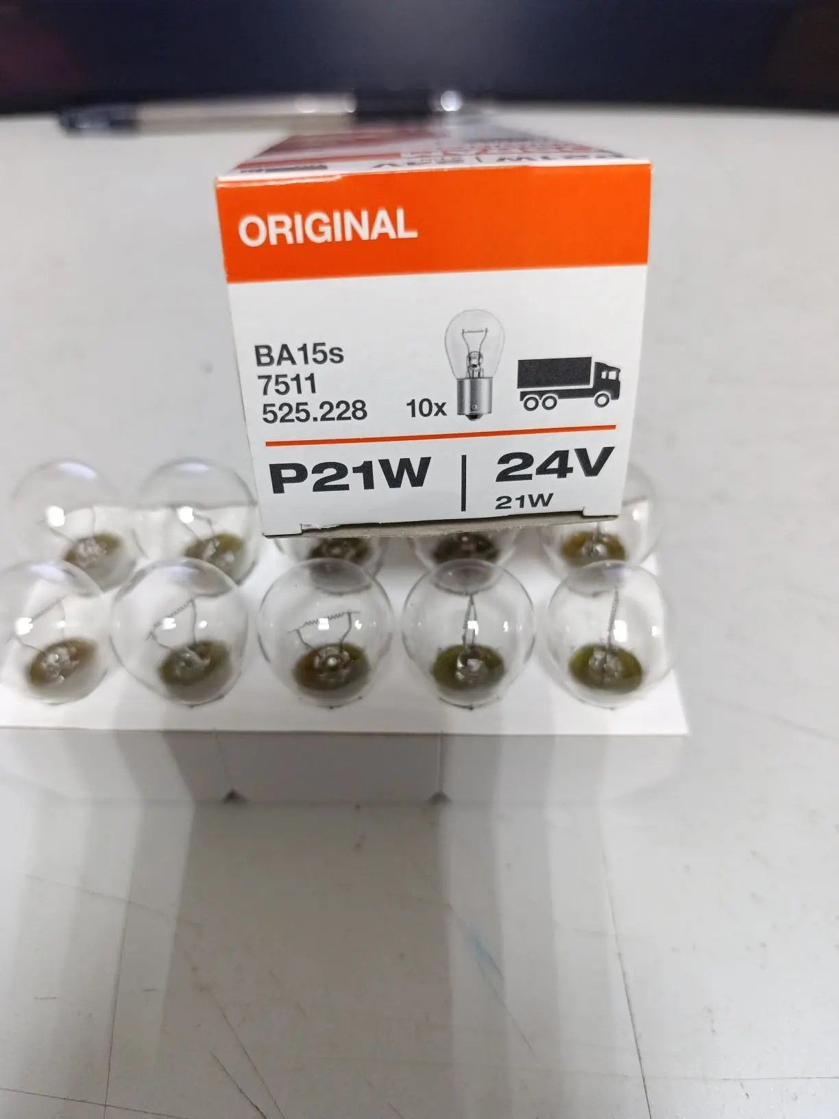 7511 OSRAM Лампа P21W 24V, фото 1